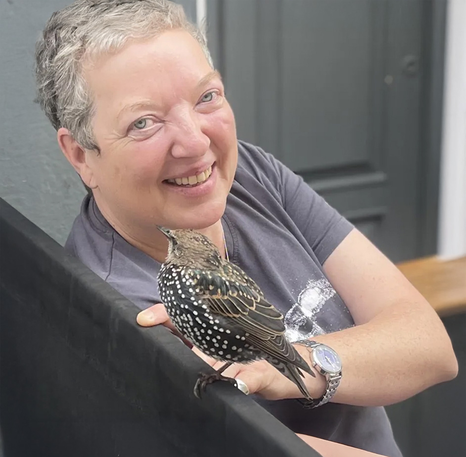 Portrait of Angela with a bird