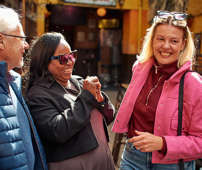 Smiling people in a street